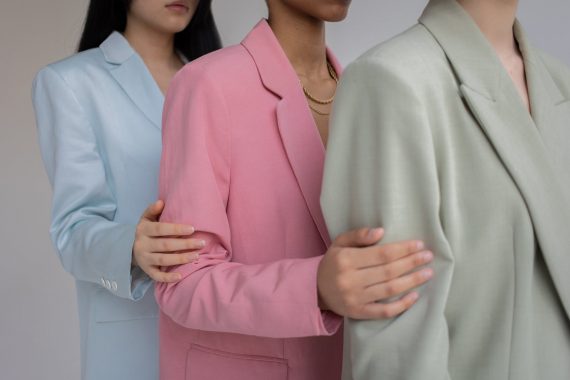 row of diverse women in formal wear