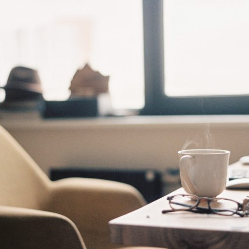 coffee cup and glasses on a table