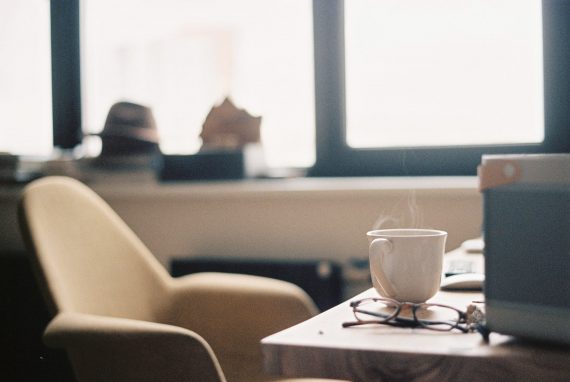 coffee cup and glasses on a table