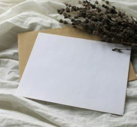 white printer paper on white textile