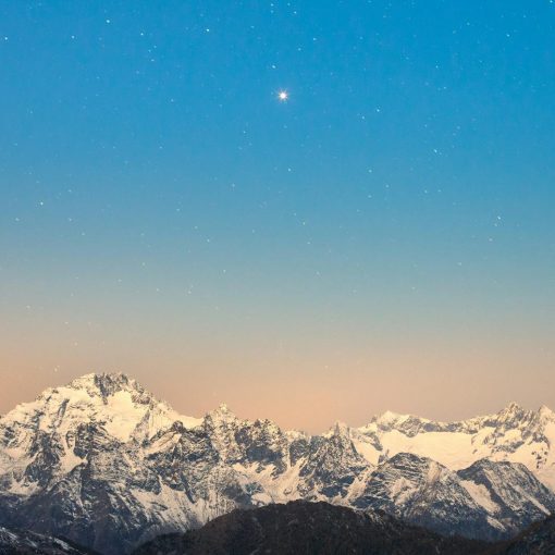 snow covered mountain under blue sky