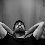young man staring at the ceiling